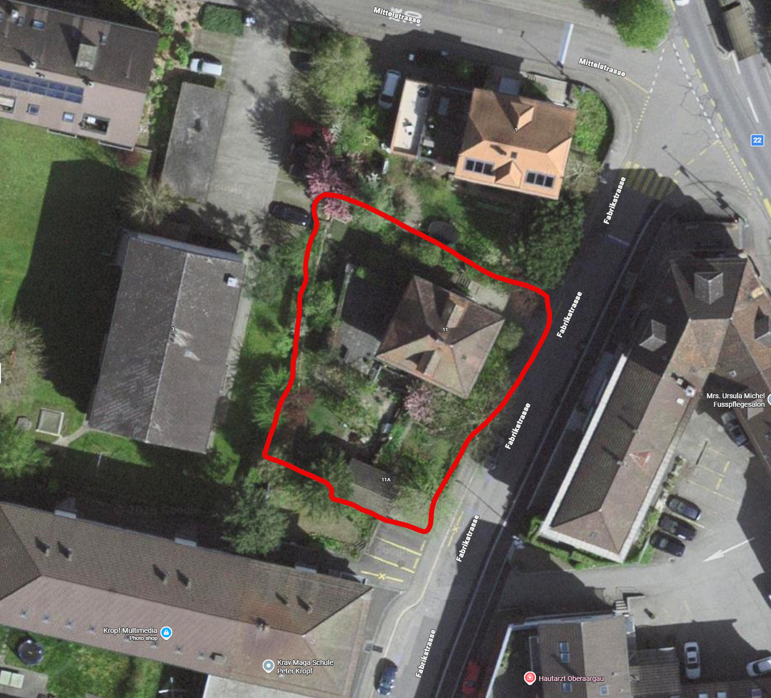 Luftbild mit Grundstücksmarkierung